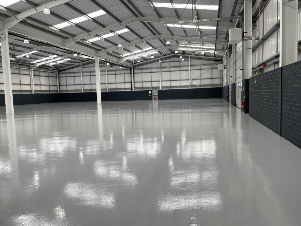 1,850m² industrial resin flooring installation completed by Q Flooring Systems at Carrington Gateway